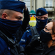 A police officer faces a woman as she argues against a pro-life counter protest on October 25, 2020 in Krakow, Poland, as the country tightened its abortion restrictions.
